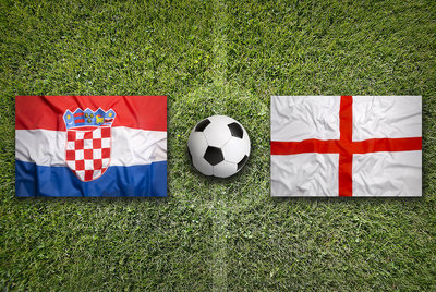 Croatia and England Flags on Football Pitch