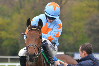 Racehorse Un De Sceaux with Jockey